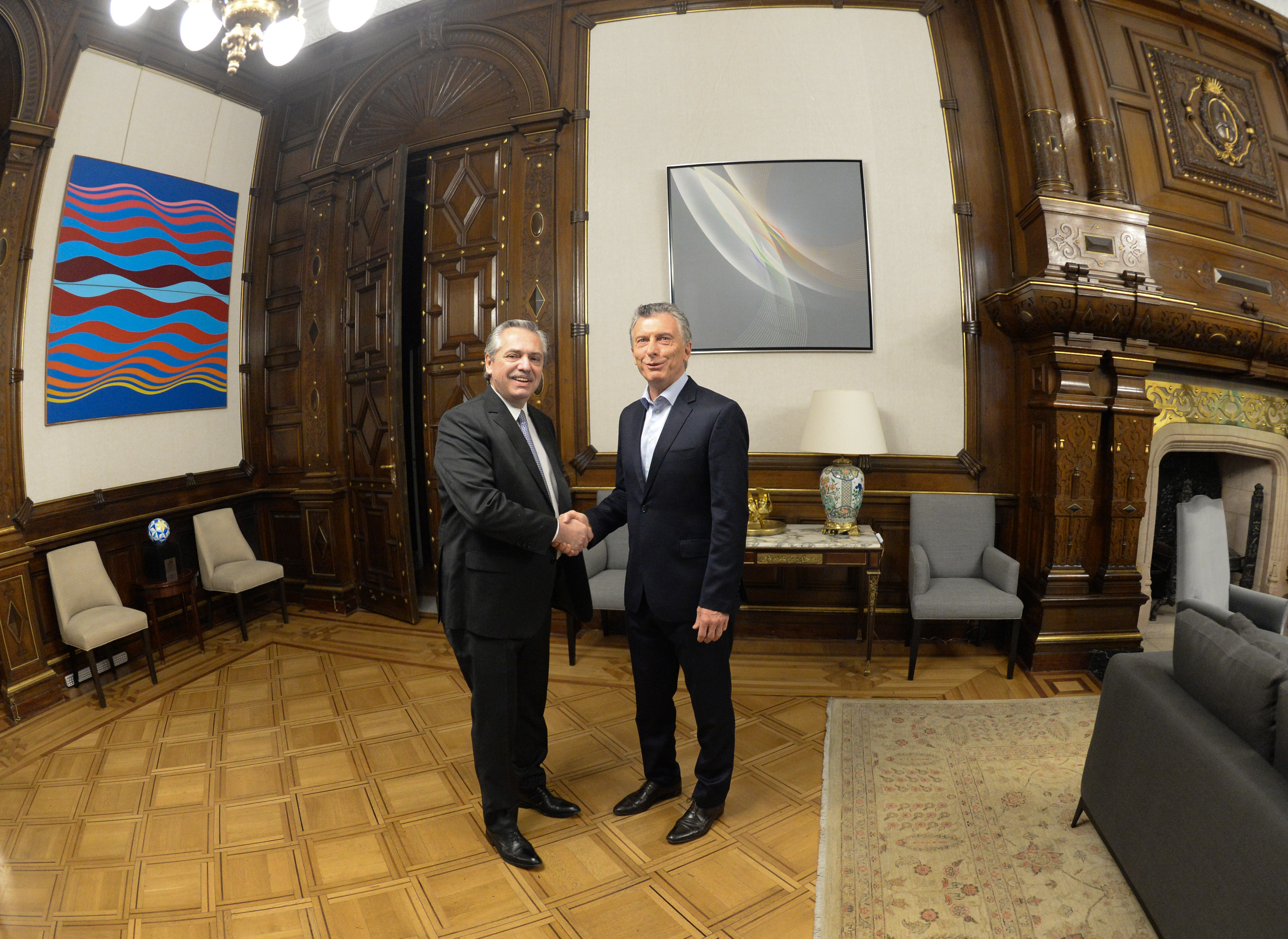 Mauricio Macri meets president-elect, Alberto Fernández, at the Casa Rosada