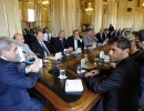 El jefe de Gabinete y el Ministro de Economía junto a empresarios del Transporte