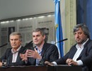 Marcos Peña, Oscar Aguad y Miguel de Godoy en Casa de Gobierno