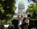 El presidente Mauricio Macri   junto a la primera dama se trasladan hacia la Casa Rosada para recibir los atributos.