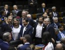 El presidente participó del acto de jura de Lula en el Congreso nacional de Brasil