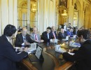 El jefe de Gabinete se reunió con empresarios de la Asociación de Supermercados Unidos 